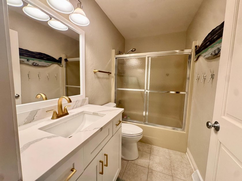Experience exceptional Northwoods lakefront living with this - photo 9