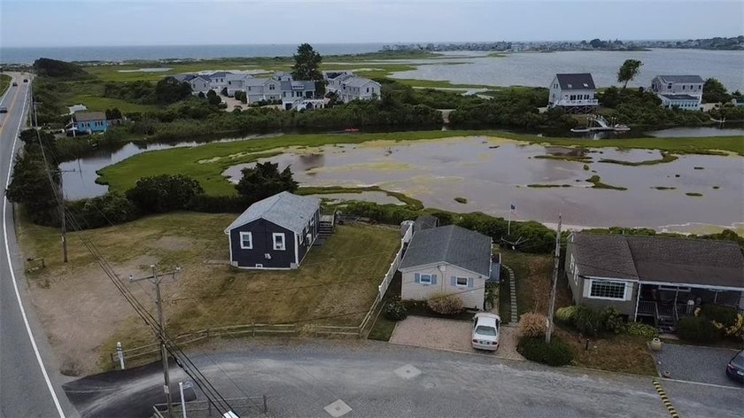 Rare 3 bed 1 bath waterfront cottage on Potter Pond!!! Located - photo 5