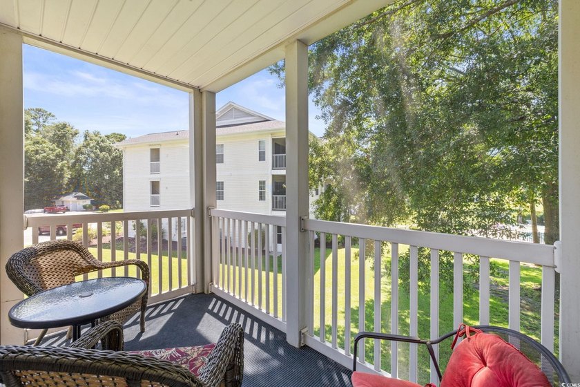MOVE IN READY! FULLY FURNISHED! This beautiful end unit condo is - photo 2