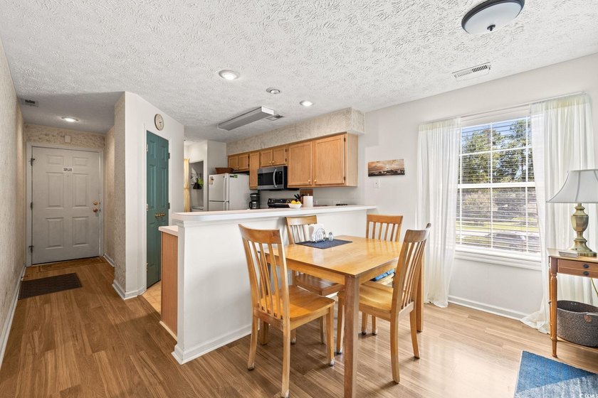 MOVE IN READY! FULLY FURNISHED! This beautiful end unit condo is - photo 7
