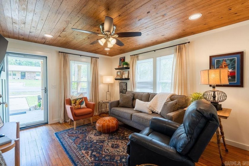 1323 W Searcy Street quietly delivers. Crisp white siding with - photo 4