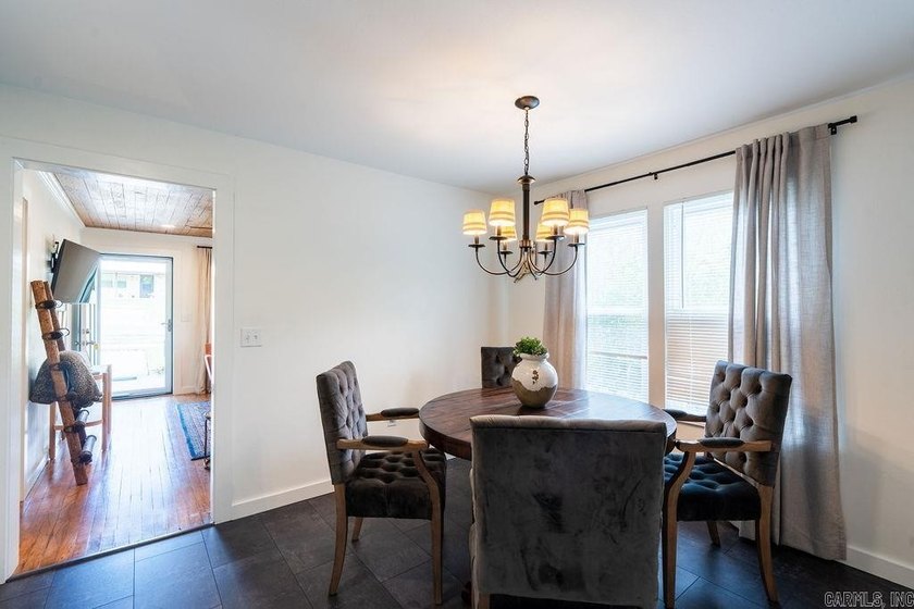 1323 W Searcy Street quietly delivers. Crisp white siding with - photo 8