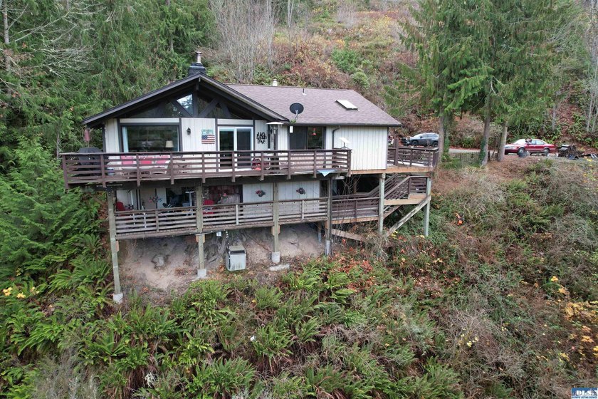 Set on over 5 private acres, this distinctive 2270sf home blends - photo 15