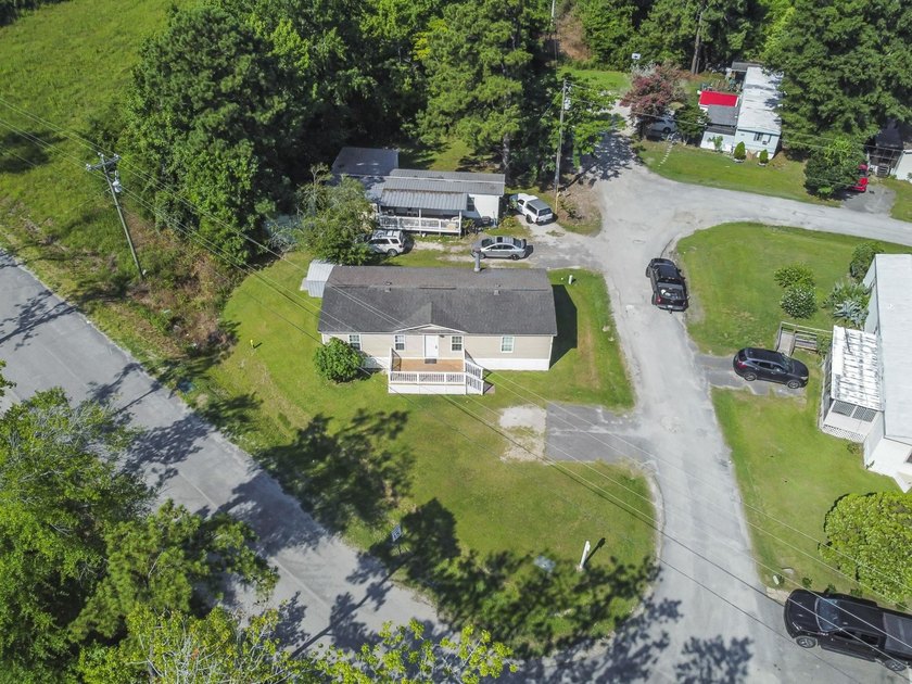 Coastal convenience meets move-in-ready comfort in the heart of - photo 2