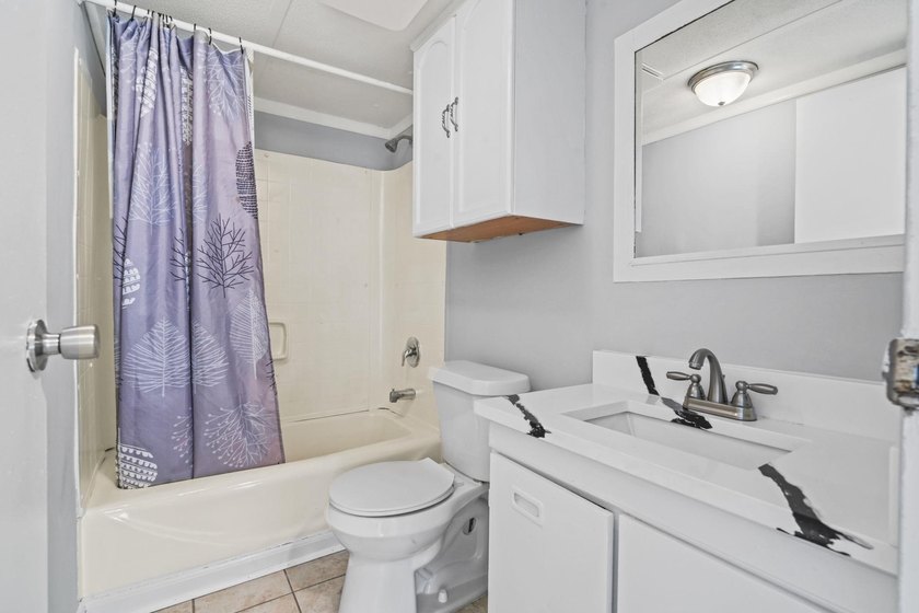 Coastal convenience meets move-in-ready comfort in the heart of - photo 10