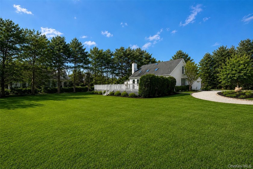 Located south of the highway on a private flag-lot, this updated - photo 13