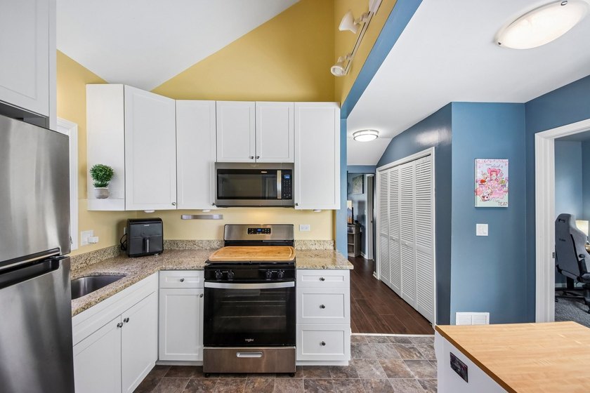 FULLY RENOVATED in 2023, this 3-bedroom home on a corner lot - photo 4
