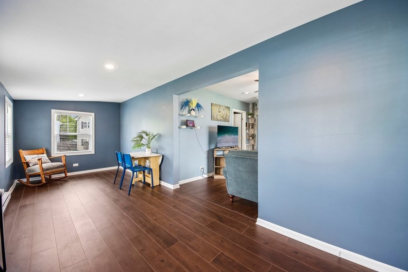 FULLY RENOVATED in 2023, this 3-bedroom home on a corner lot - photo 7