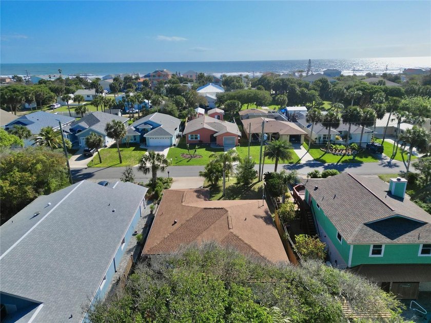 Enjoy coastal living just steps from the beach in this charming - photo 3