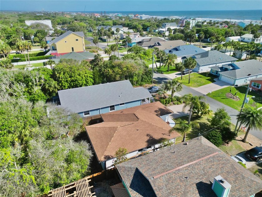 Enjoy coastal living just steps from the beach in this charming - photo 4