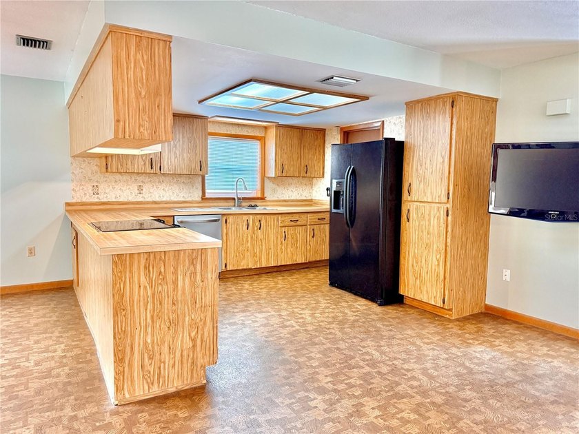 Enjoy coastal living just steps from the beach in this charming - photo 9