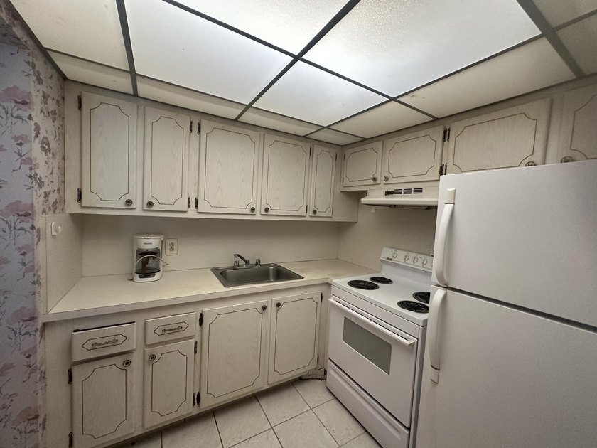AS-IS!!!! Handyman special in the desirable 55+ community of - photo 3