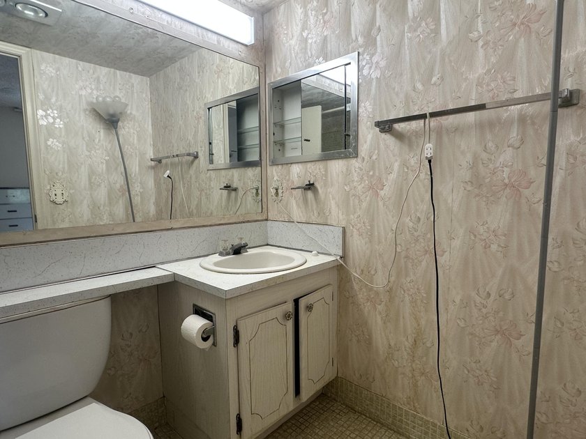 AS-IS!!!! Handyman special in the desirable 55+ community of - photo 6