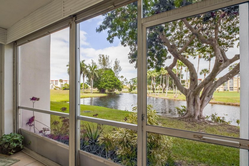 WELCOME TO THIS VERY DESIRABLE CORNER CONDO WITH BEAUTIFUL WATER - photo 4
