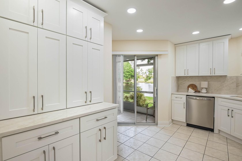 WELCOME TO THIS VERY DESIRABLE CORNER CONDO WITH BEAUTIFUL WATER - photo 7
