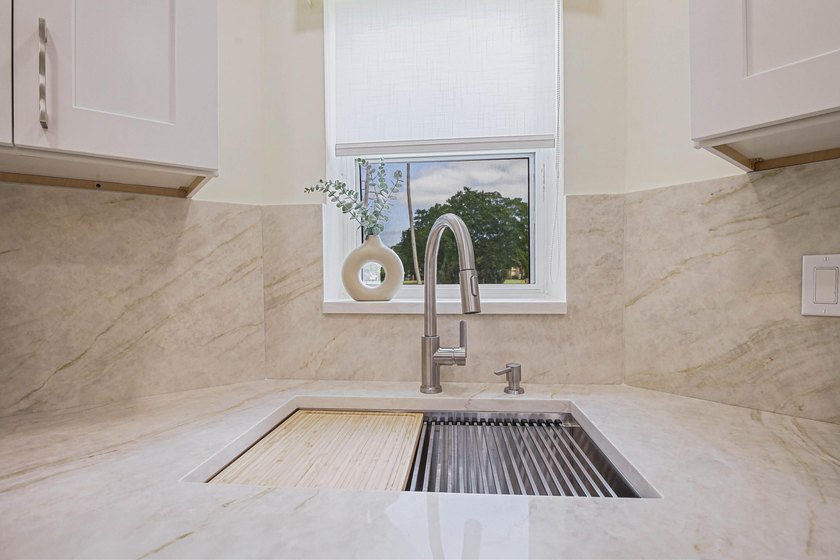 WELCOME TO THIS VERY DESIRABLE CORNER CONDO WITH BEAUTIFUL WATER - photo 8