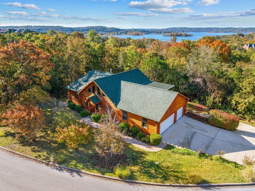 Below Market Value Custom Oak Log Home in Gated Emerald Pointe - photo 4