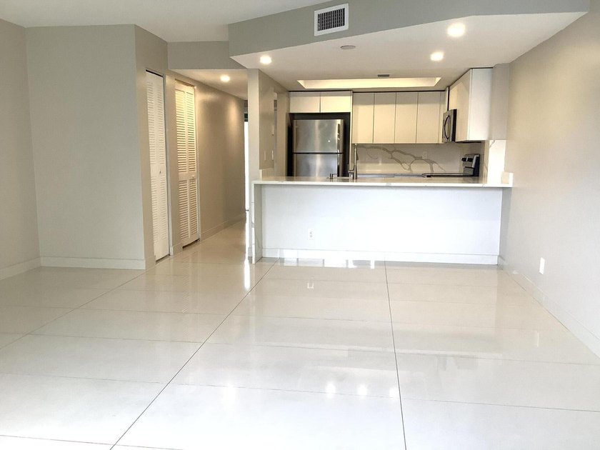 This beautifully renovated 2-bedroom, 2-bathroom townhouse is - photo 6