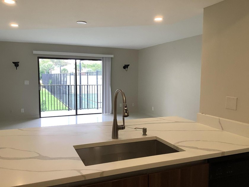 This beautifully renovated 2-bedroom, 2-bathroom townhouse is - photo 7