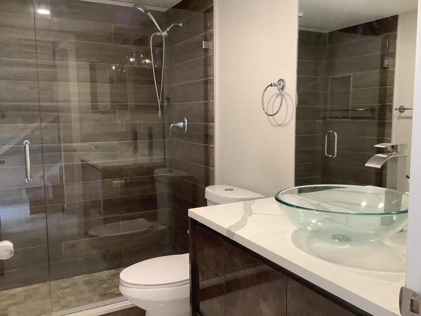 This beautifully renovated 2-bedroom, 2-bathroom townhouse is - photo 9