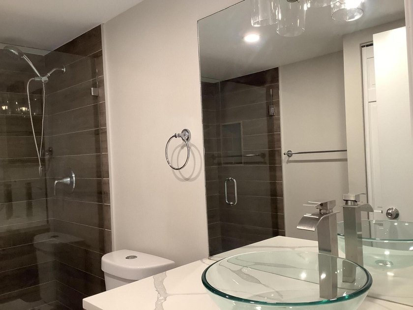 This beautifully renovated 2-bedroom, 2-bathroom townhouse is - photo 10