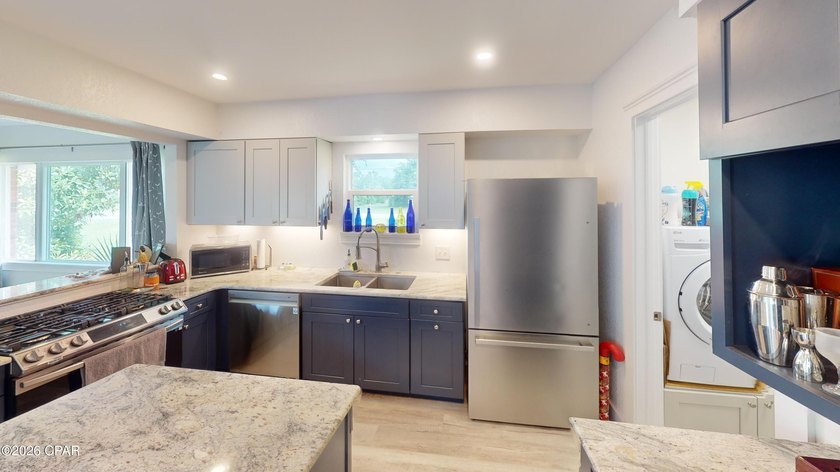 Welcome to 2001 Palm Boulevard, where coastal convenience meets - photo 11