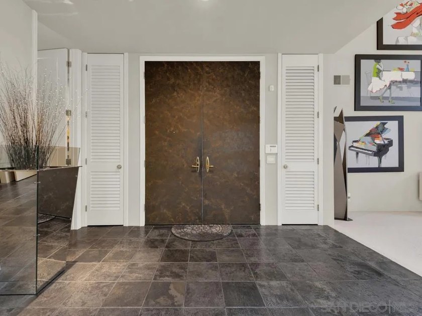 Nestled on a private corner lot within the prestigious gated - photo 10