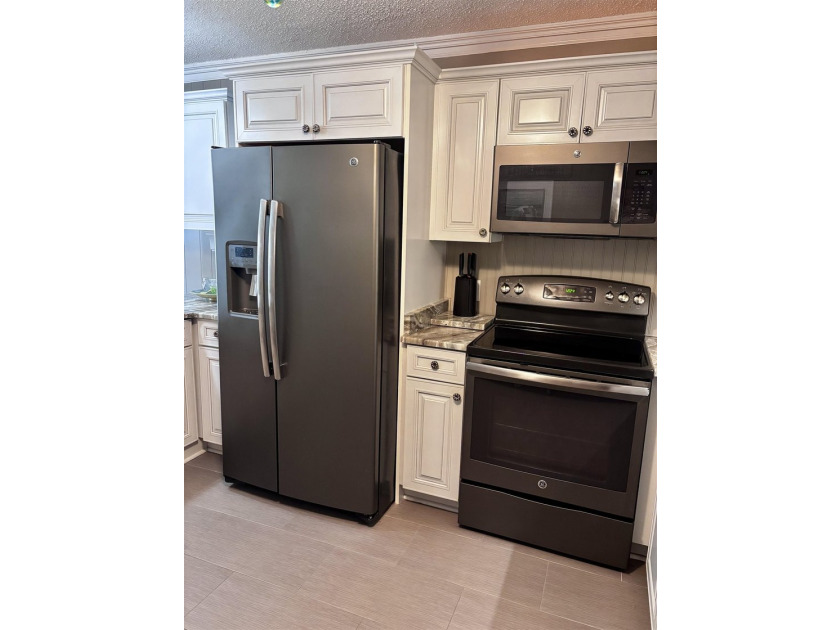 This is the condo that you've been waiting for! Beautifully - photo 10