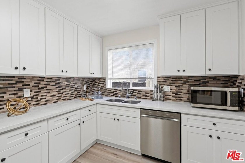 Rarely does a fully remodeled 4-bedroom, 3-bathroom, 1,504 - photo 13