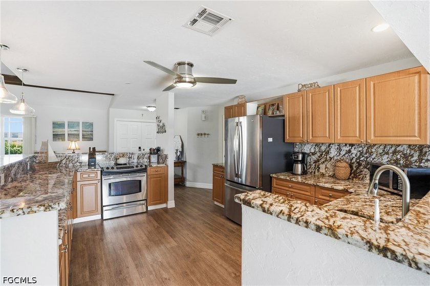 Welcome to your slice of paradise! This beautifully maintained 1 - photo 10