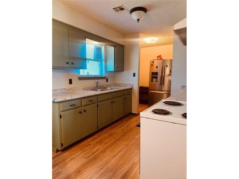 Updated 3-bedroom, 2-bathroom home situated in a quiet rural - photo 4