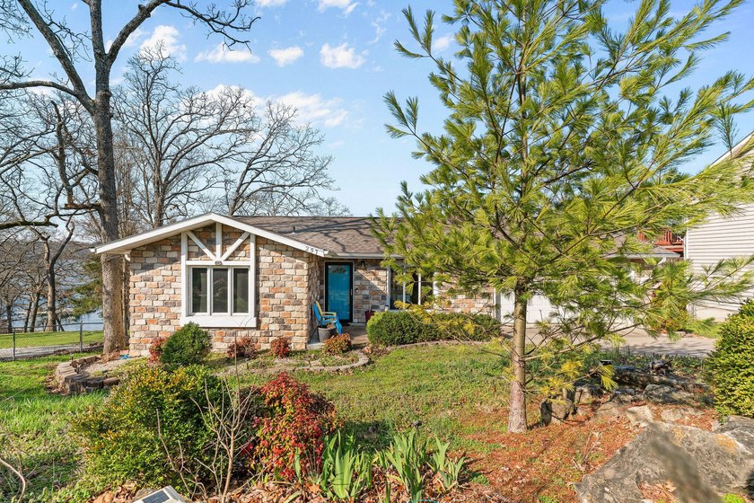 Experience true lakefront living on Table Rock Lake, just - photo 2