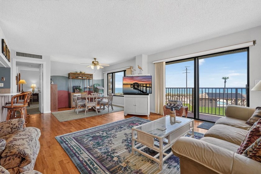 RARE 3-BEDROOM, 3-BATH CORNER RESIDENCE WITH TWO PRIMARY SUITES - photo 3