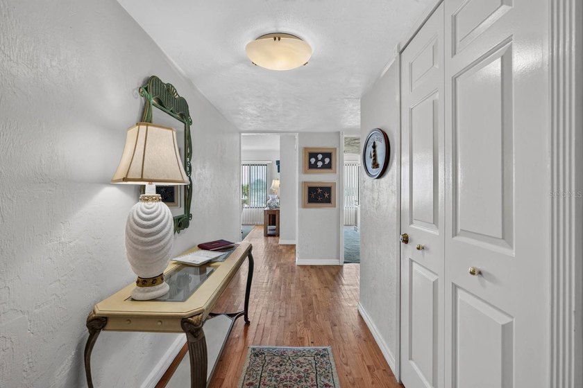 RARE 3-BEDROOM, 3-BATH CORNER RESIDENCE WITH TWO PRIMARY SUITES - photo 4