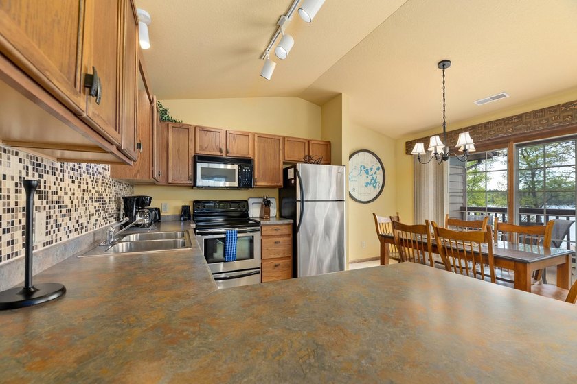 Your Eagle River Chain getaway awaits at Wild Eagle Lodge! This - photo 7