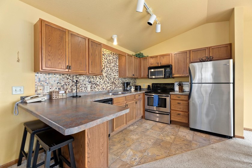 Your Eagle River Chain getaway awaits at Wild Eagle Lodge! This - photo 8
