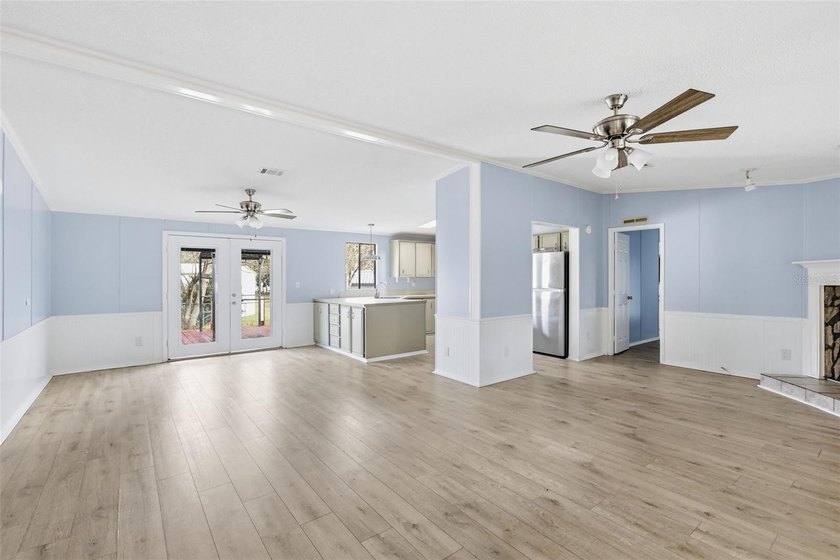 Set on just over half an acre, this 1989 double-wide mobile home - photo 9