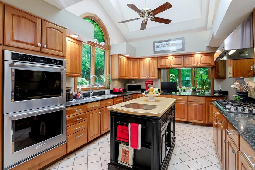 Set on nearly 6 wooded acres, this contemporary custom home - photo 6