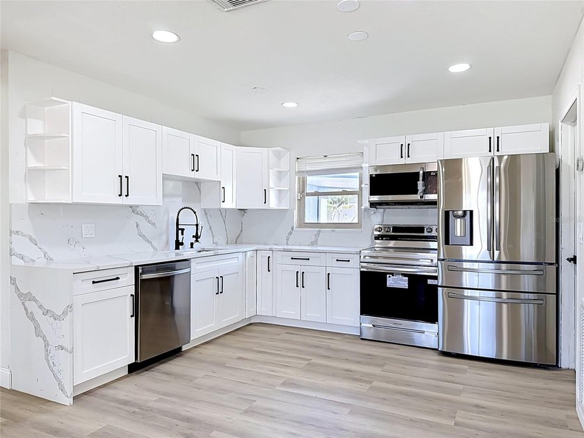 Fully Remodeled Tampa Gem with Brand-New Roof, All New - photo 2