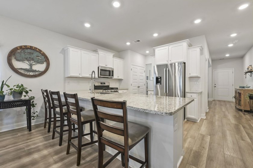 Welcome to this beautifully maintained Kensington floor plan in - photo 8