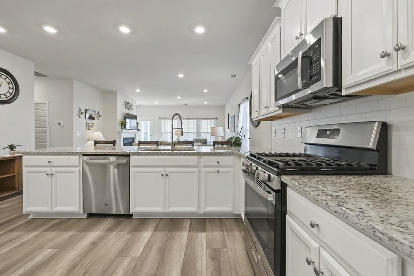 Welcome to this beautifully maintained Kensington floor plan in - photo 9