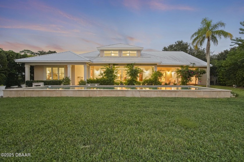 Experience luxurious riverfront living in this striking - photo 8
