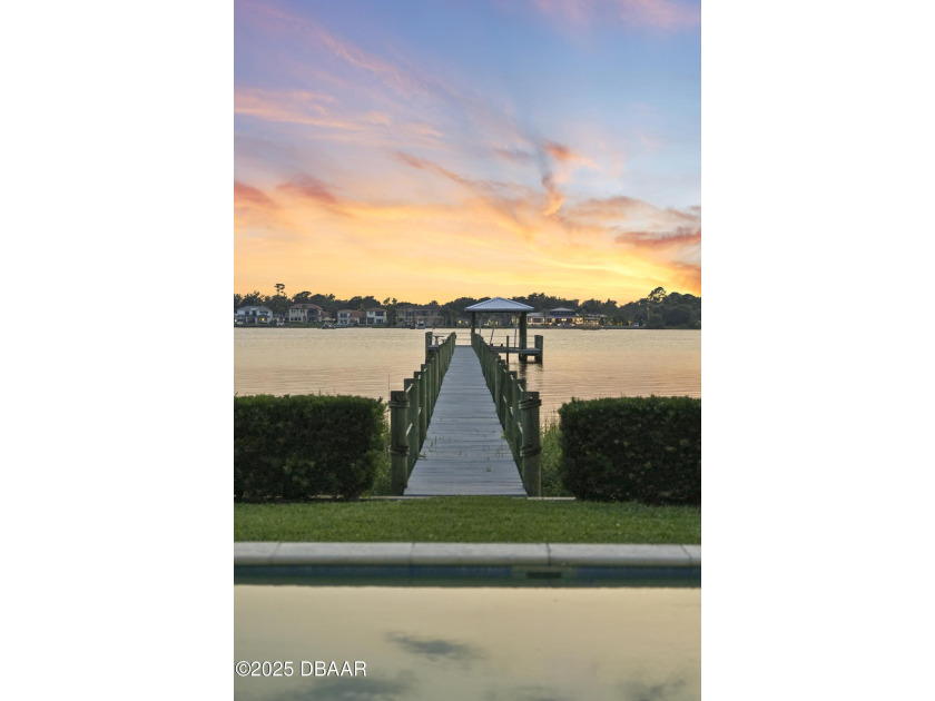 Experience luxurious riverfront living in this striking - photo 10