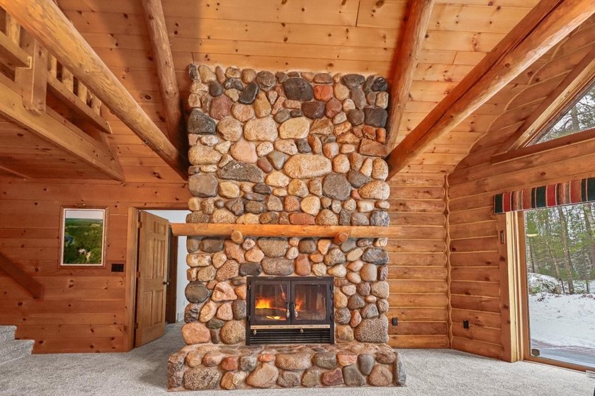 Escape to the ultimate log home sanctuary on nearly 75 pristine - photo 5