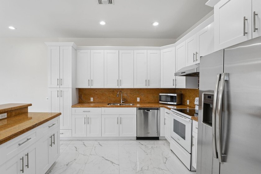 Welcome to your stunning home in the highly coveted Tarpon River - photo 3