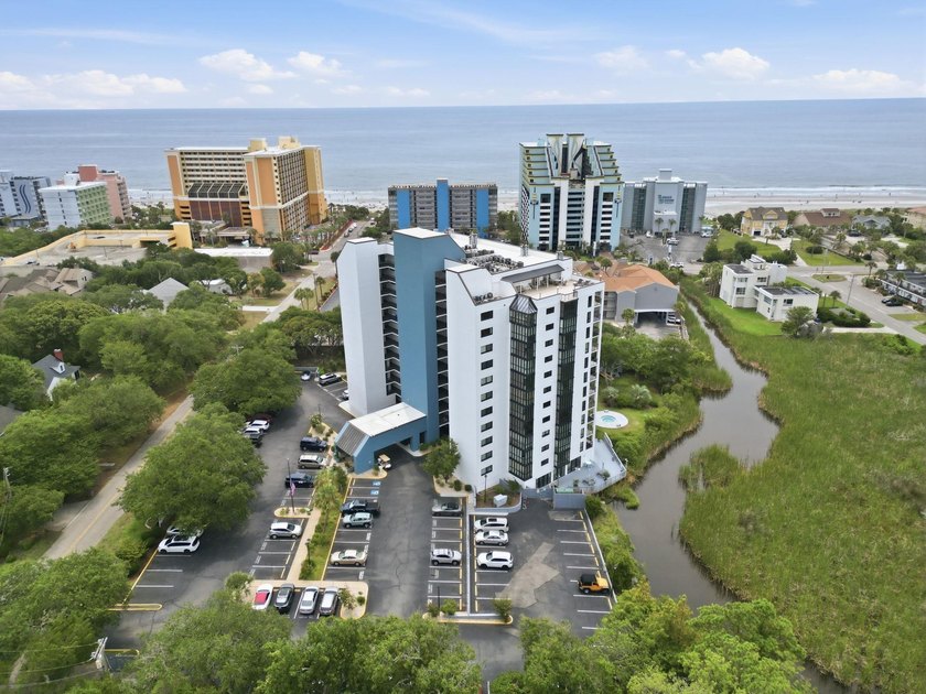 Welcome to Unit 102 at Sea Mark Towers, ideally located just a - photo 2