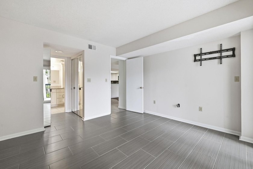 Welcome to Unit 102 at Sea Mark Towers, ideally located just a - photo 10