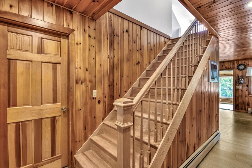 PRIVATE LAKEFRONT HOME. Welcome to your serene 8-acre hideaway - photo 36