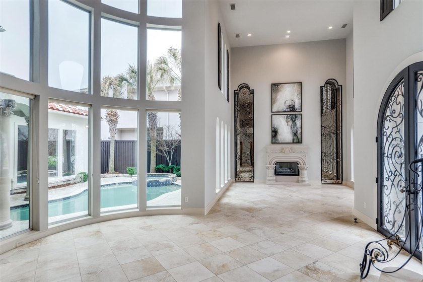 Stunning Mediterranean style home featuring 5 bedrooms, 3 living - photo 5