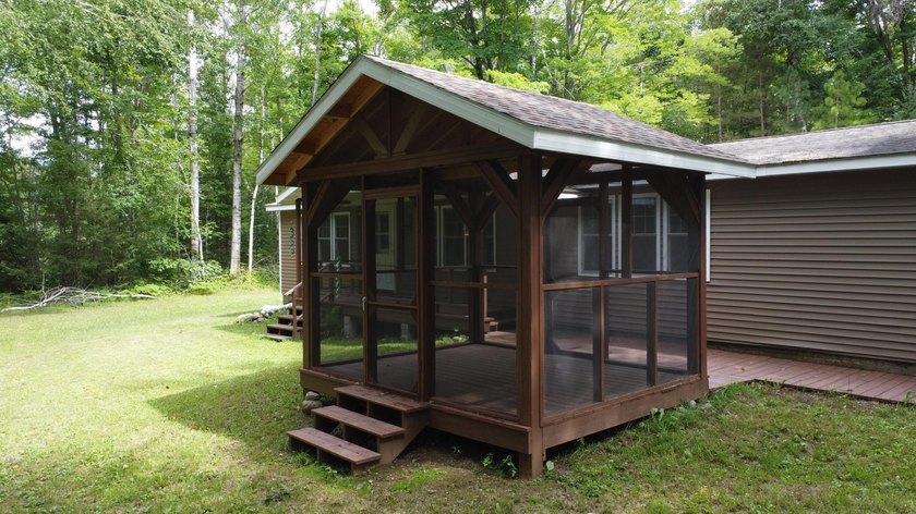 Enjoy year-round living on your 1.5 acres including 160 feet of - photo 6